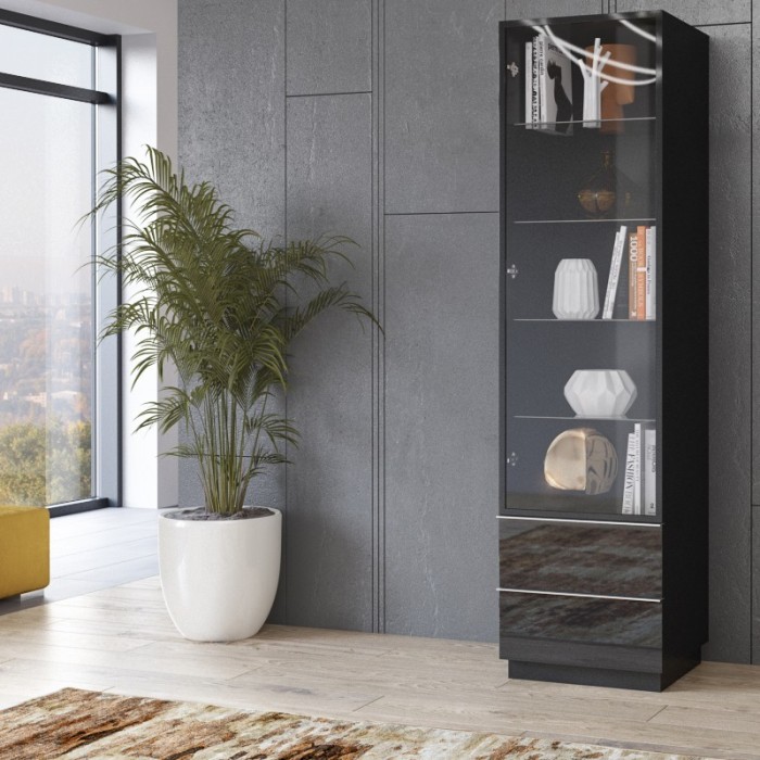 Vitrine haute, 1 porte vitrée et 2 tiroirs collection ZANTE. Coloris noir brillant pailleté