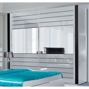 Armoire LINA blanche et noire brillante tout équipée. Meuble design pour votre chambre à coucher