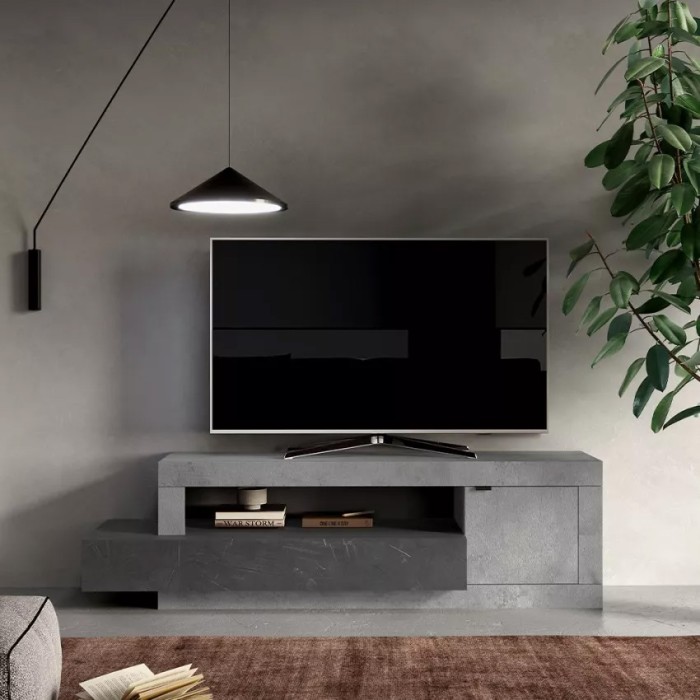 Meuble TV 1 porte 1 tiroir collection DOMI. Coloris effet béton et gris anthracite, idéal dans un salon design