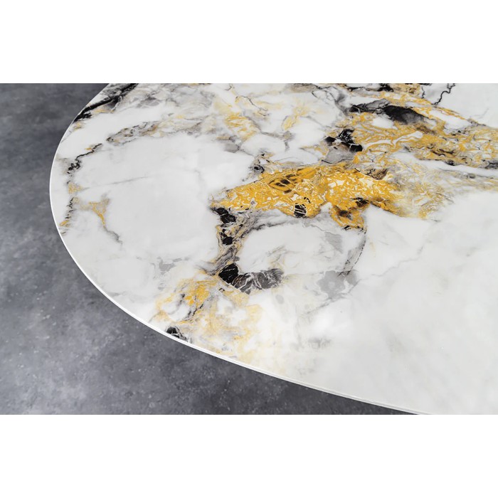 Zoom sur le plateau de la table AERIS bronze